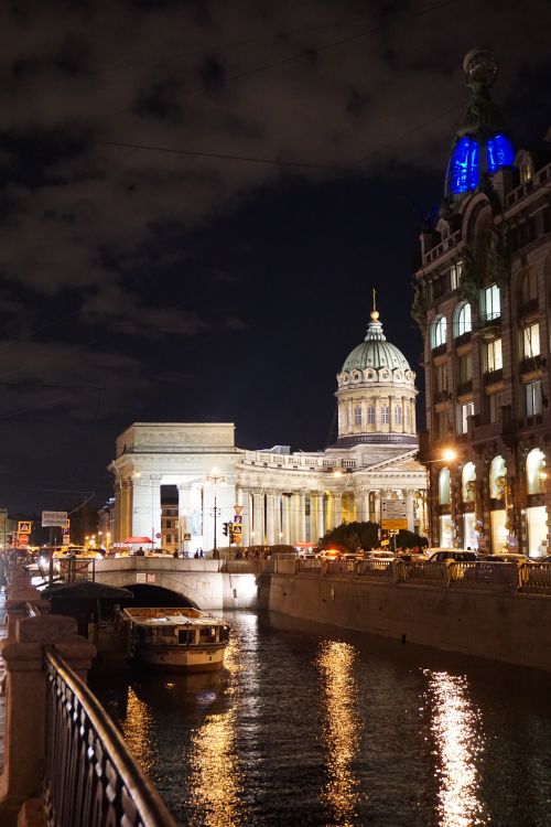 Free Night view of Saint Petersburg with Kazan Cathedral and illuminated cityscape. Stock Photo