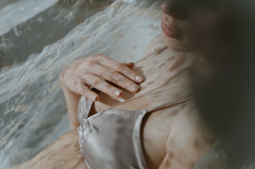 Close Up Photo of Woman in Silk Brassiere 