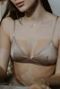 Close Up Photo of Woman in Silk Brassiere