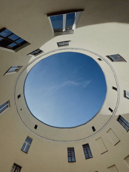 Upward View of Sky from Patio of Round Building