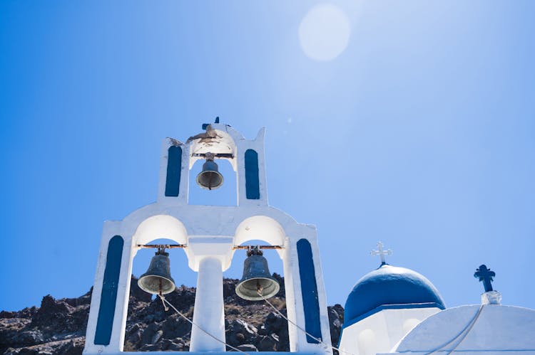 White And Blue Dome Roof Of Church With Bells