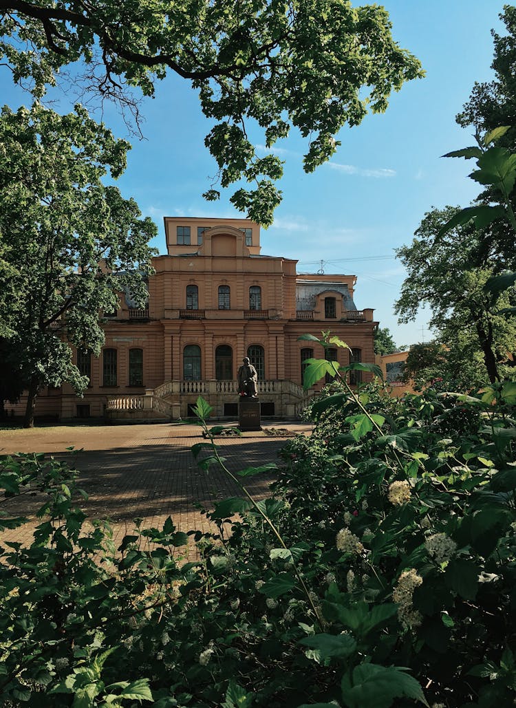 Sculpture In Front Of Mansion