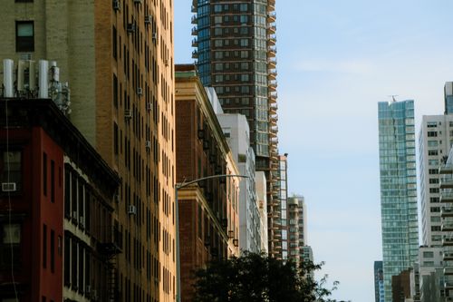 Free A bustling metropolitan cityscape with diverse architecture and towering skyscrapers. Stock Photo
