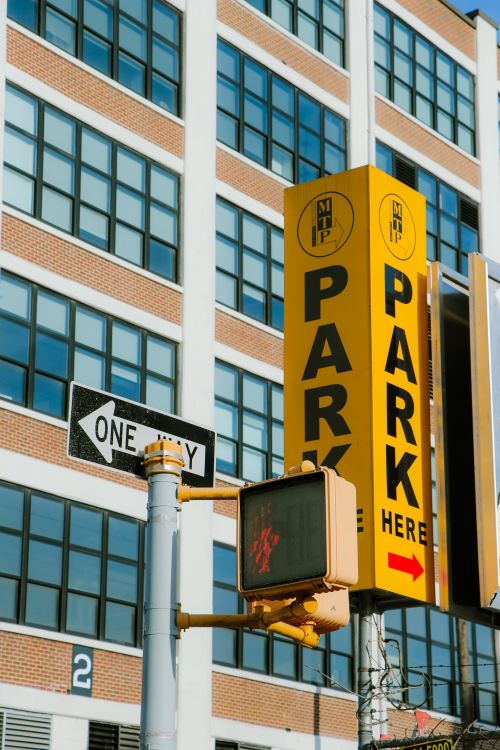 Window Box Parking Sign Parking Signage on a Metal Post · Free Stock Photo