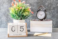 White and Black Analog Table Clock at 10 00