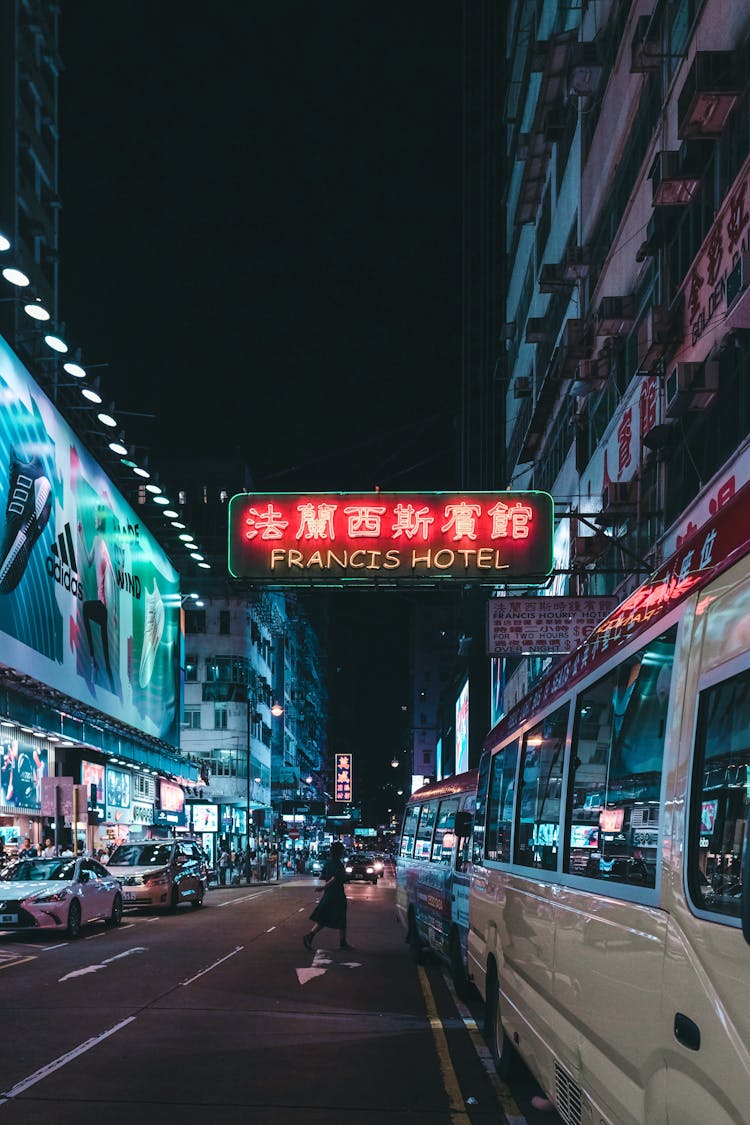 Photograph Of A Busy Street During The Night