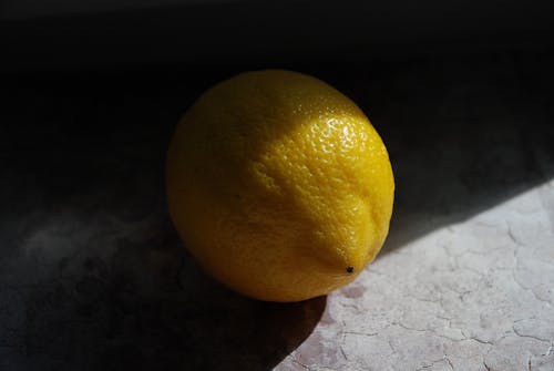 A Yellow Lemon in Close-Up Photography