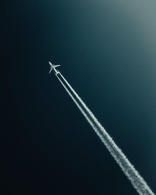 Free An Airplane in the Sky  Stock Photo