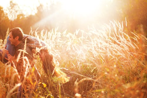 A Couple on Brown Grass Field