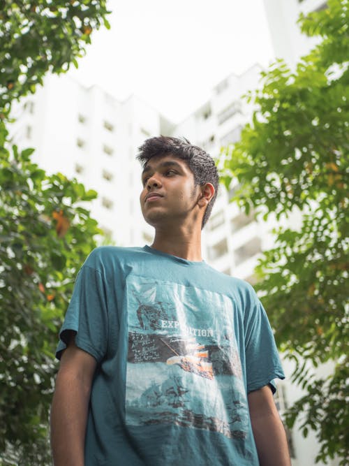 A Man Wearing a Blue Shirt