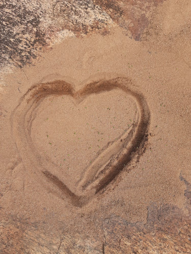 Heart Shape Drawn On Fine Sand