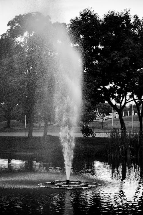 Free Water Fountain in the Middle of the Park Stock Photo