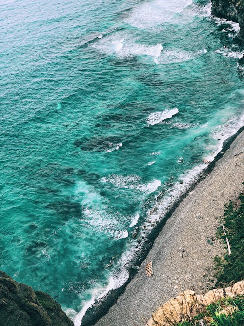 Aerial View of a Coast with Turquoise Water 