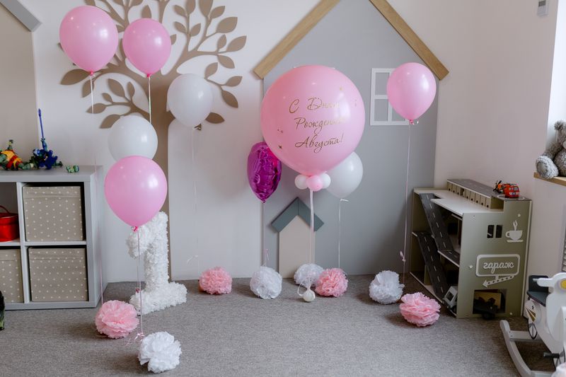 Pink birthday party decorations with themed setup for celebration