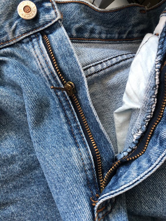 Close-Up Photograph of a Denim Jean's Zipper · Free Stock Photo