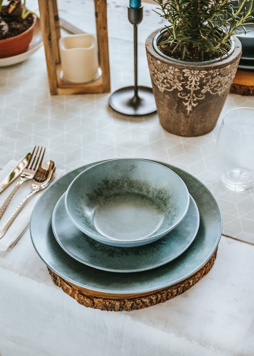 Free Boho Plates and Cutlery on Table Stock Photo
