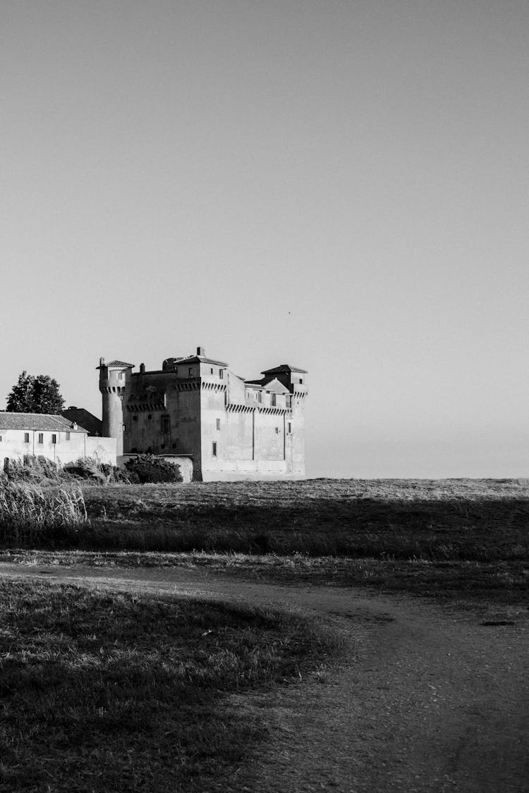 Grayscale Photograph Of The Santa Severa Castle