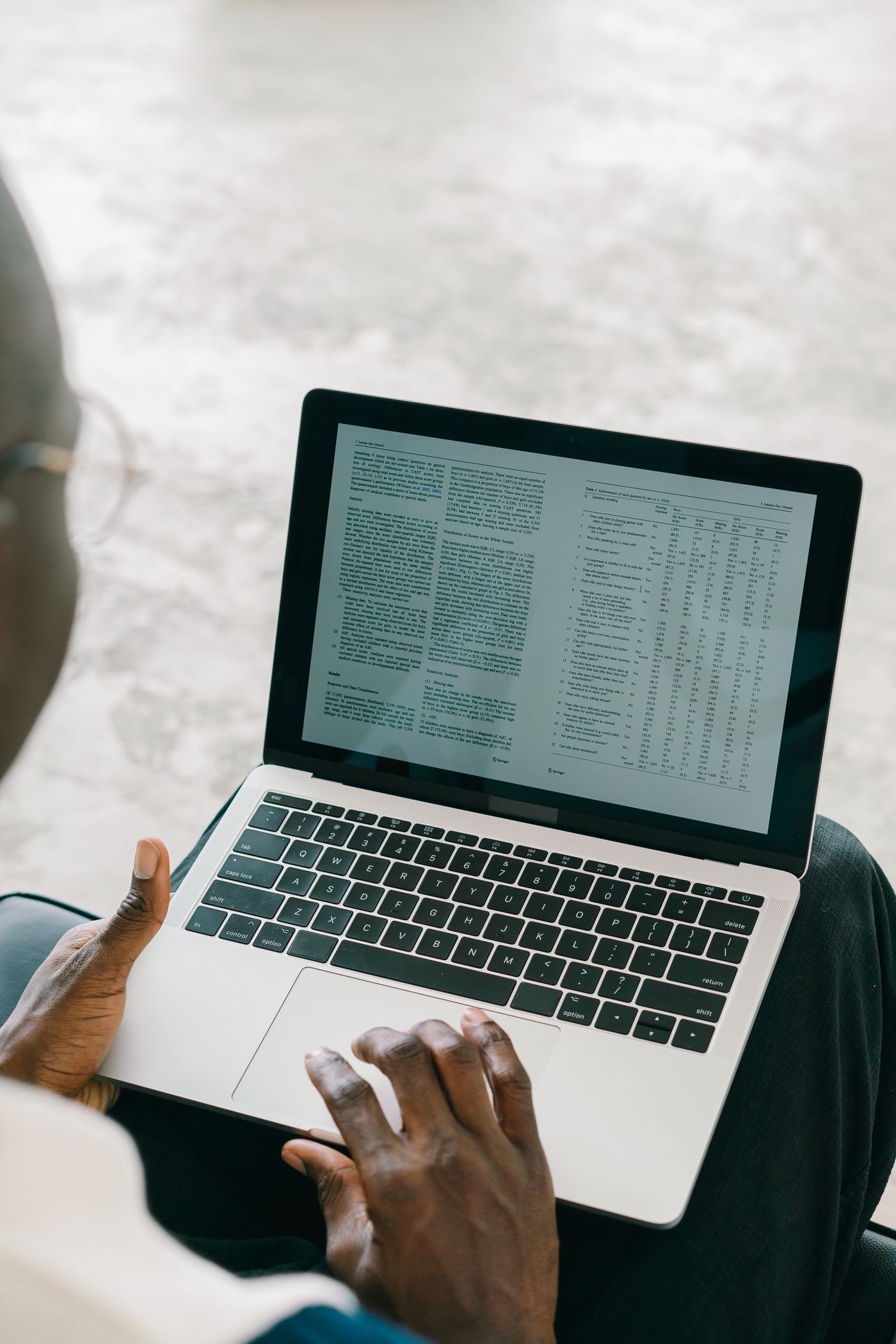 Professional reviewing spreadsheet information