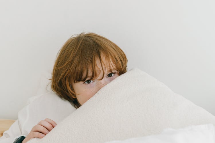 Boy Under A Blanket