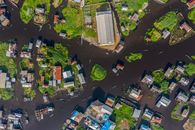 Drone view of Ganvié, a traditional stilt village on Lake Nokoué, Cotonou, Benin.