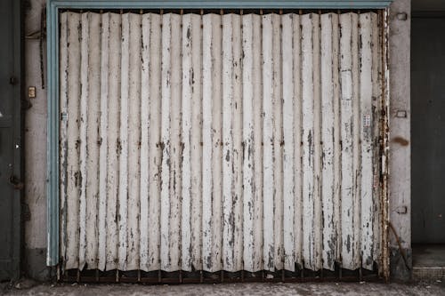 bezplatná Základová fotografie zdarma na téma garážová vrata, kov, ocel Základová fotografie