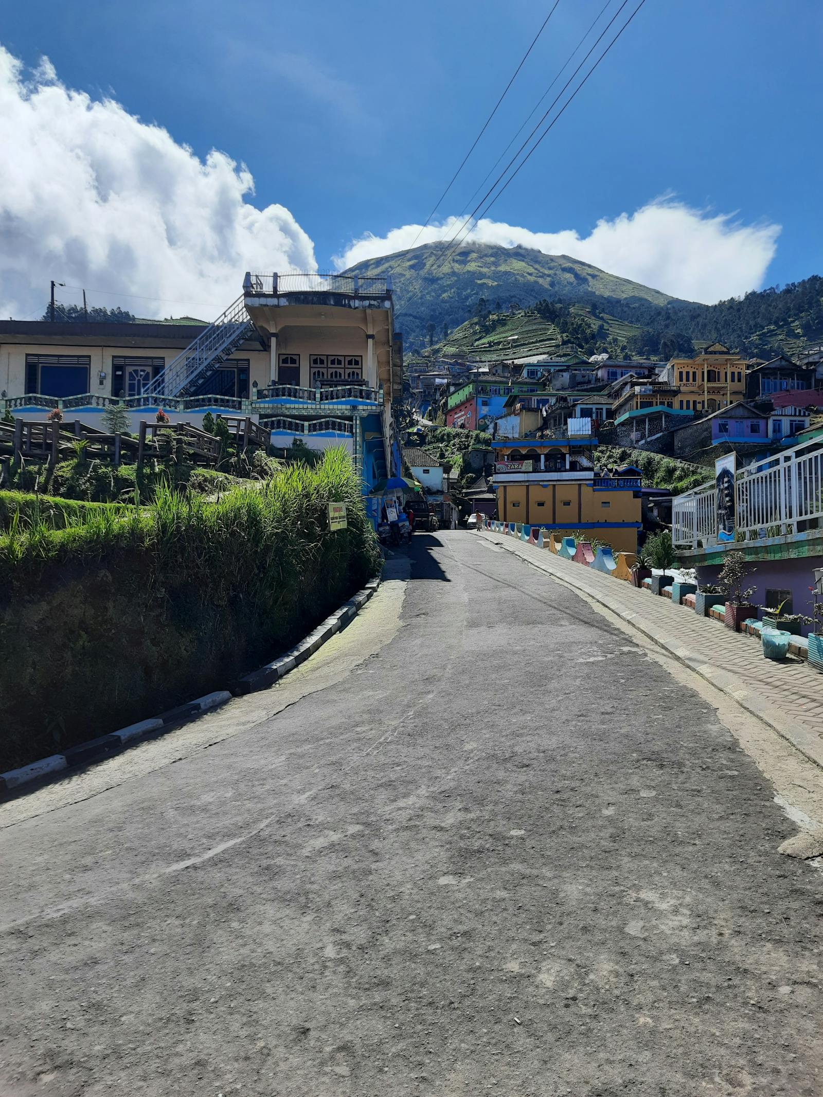 Night sky with constellations over a city skyline