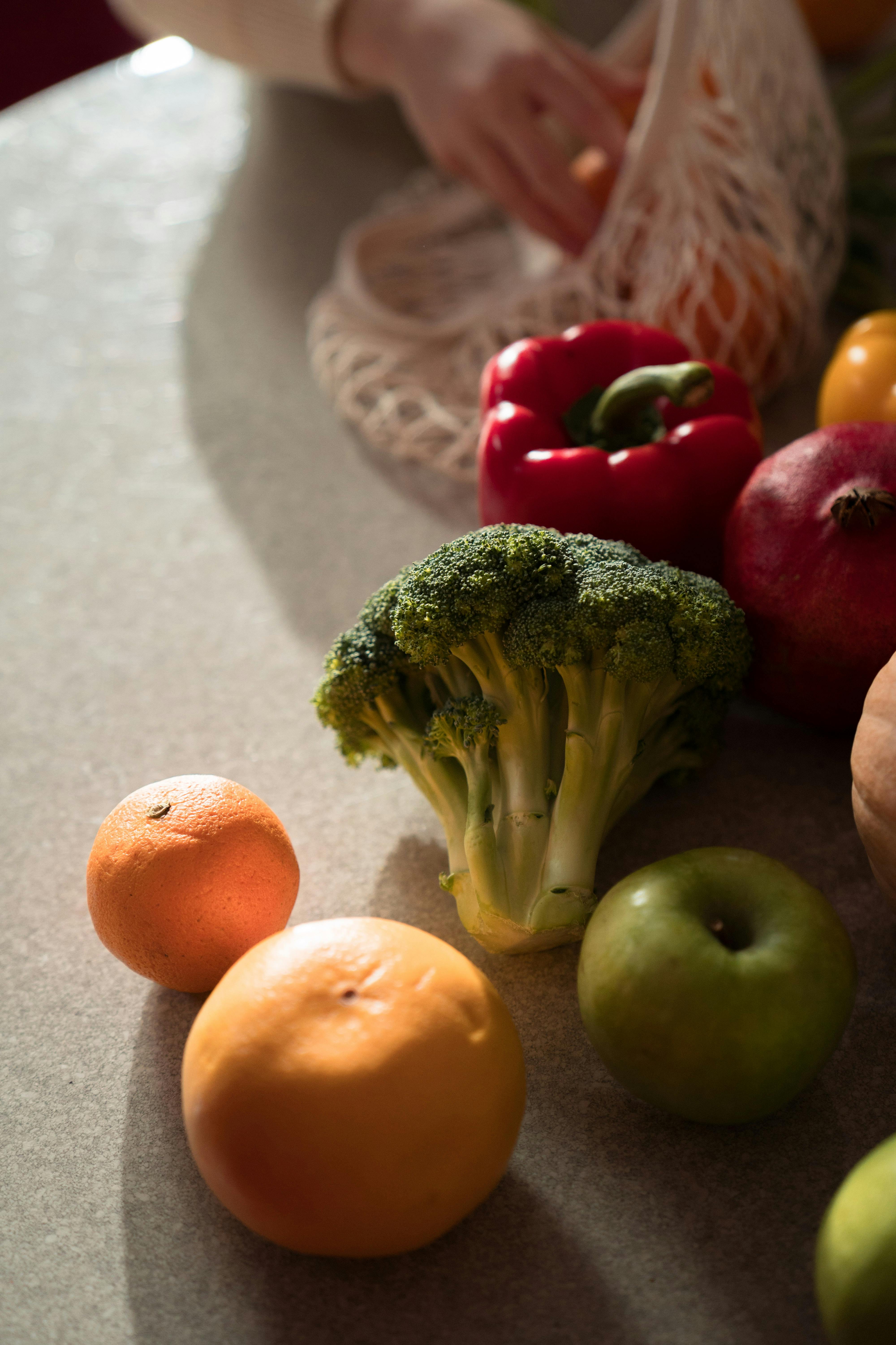 photograph of fruits and vegetables on a counter
