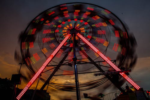 Free Red and Orange Lights on Ferris Wheel Stock Photo