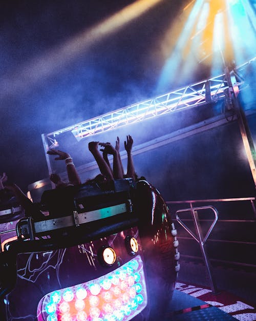 Photograph of People Riding an Amusement Ride