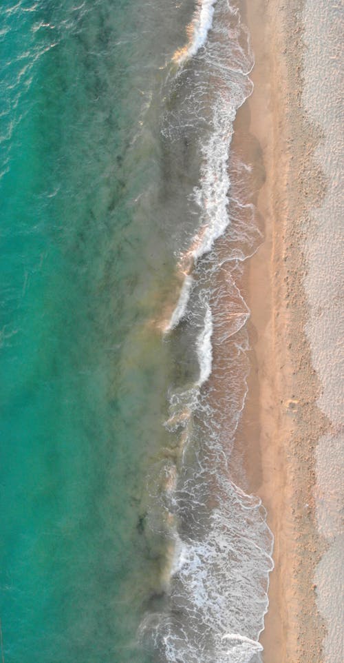 Безкоштовне стокове фото на тему «берег моря, біля океану, вертикальні постріл»
