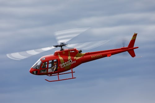 Free A Flying Red RC Helicopter Stock Photo