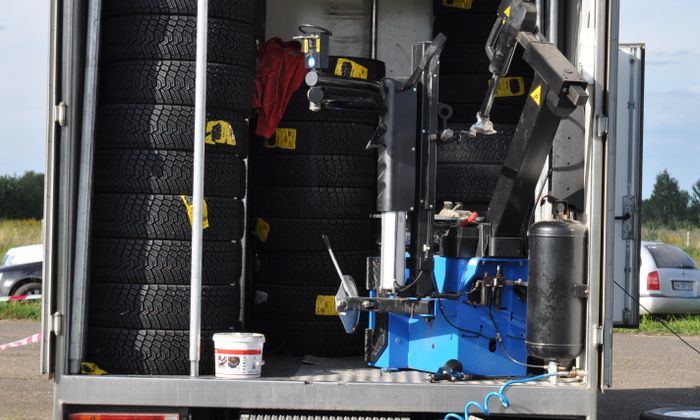 Mobile tire truck stocked with tires