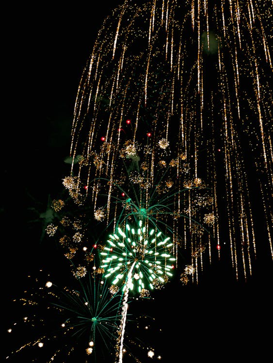 Green and Yellow Fireworks in the Sky
