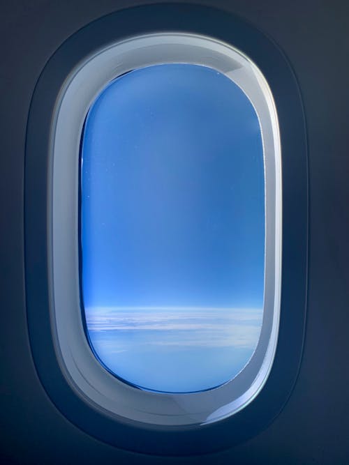 Free Close-up Photo of Airplane Window Stock Photo