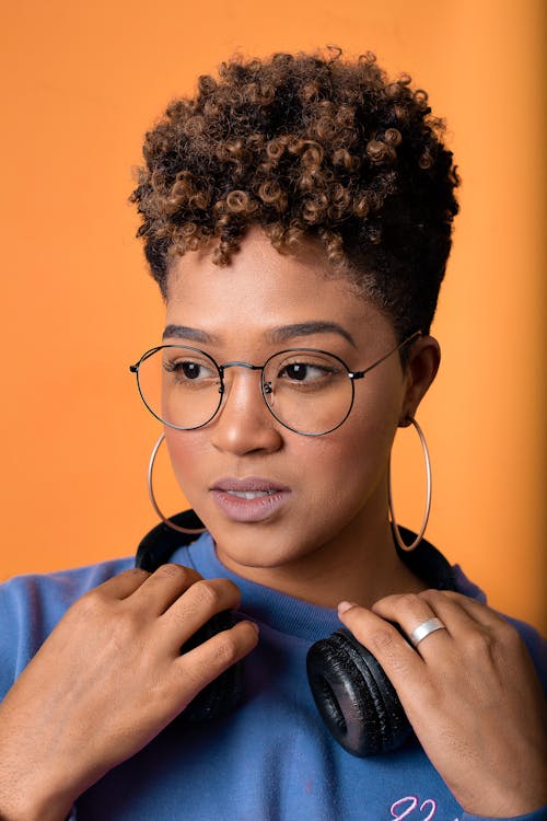 Beautiful Woman Wearing Eyeglasses and Hoop Earrings