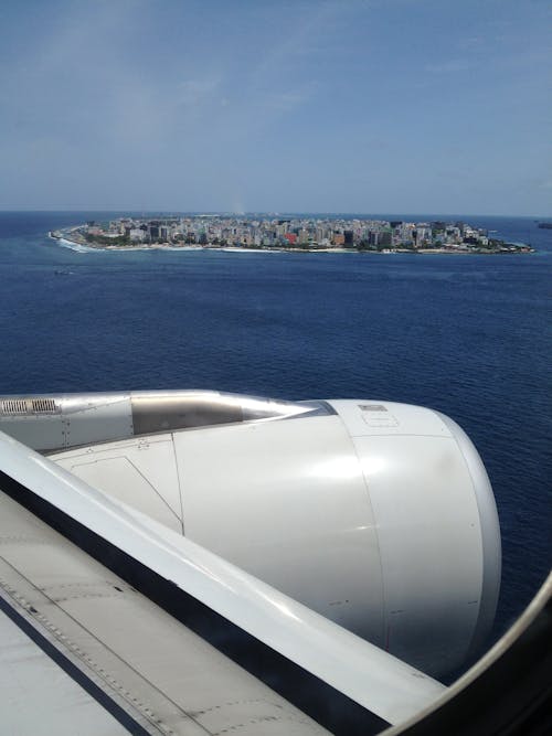 Foto profissional grátis de asa de avião, ilha, ilha da praia