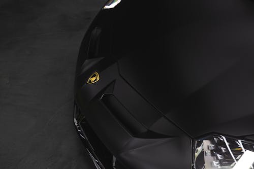 Close-Up Shot of a Bumper of a Black Sports Car