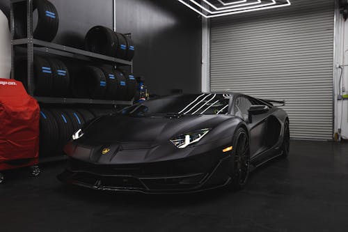 Free Black Lamborghini Aventador in a Garage Stock Photo