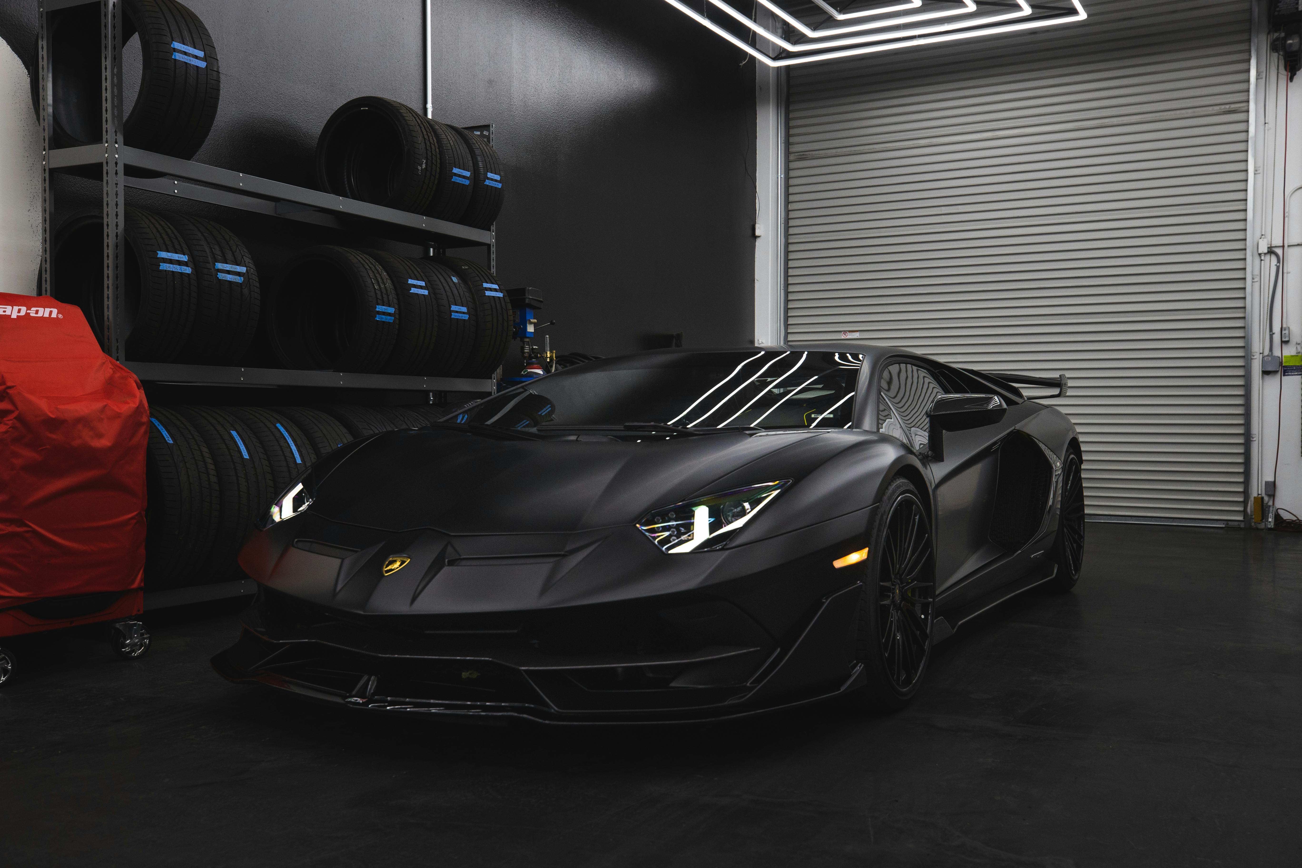 Black Lamborghini Aventador in a Garage · Free Stock Photo