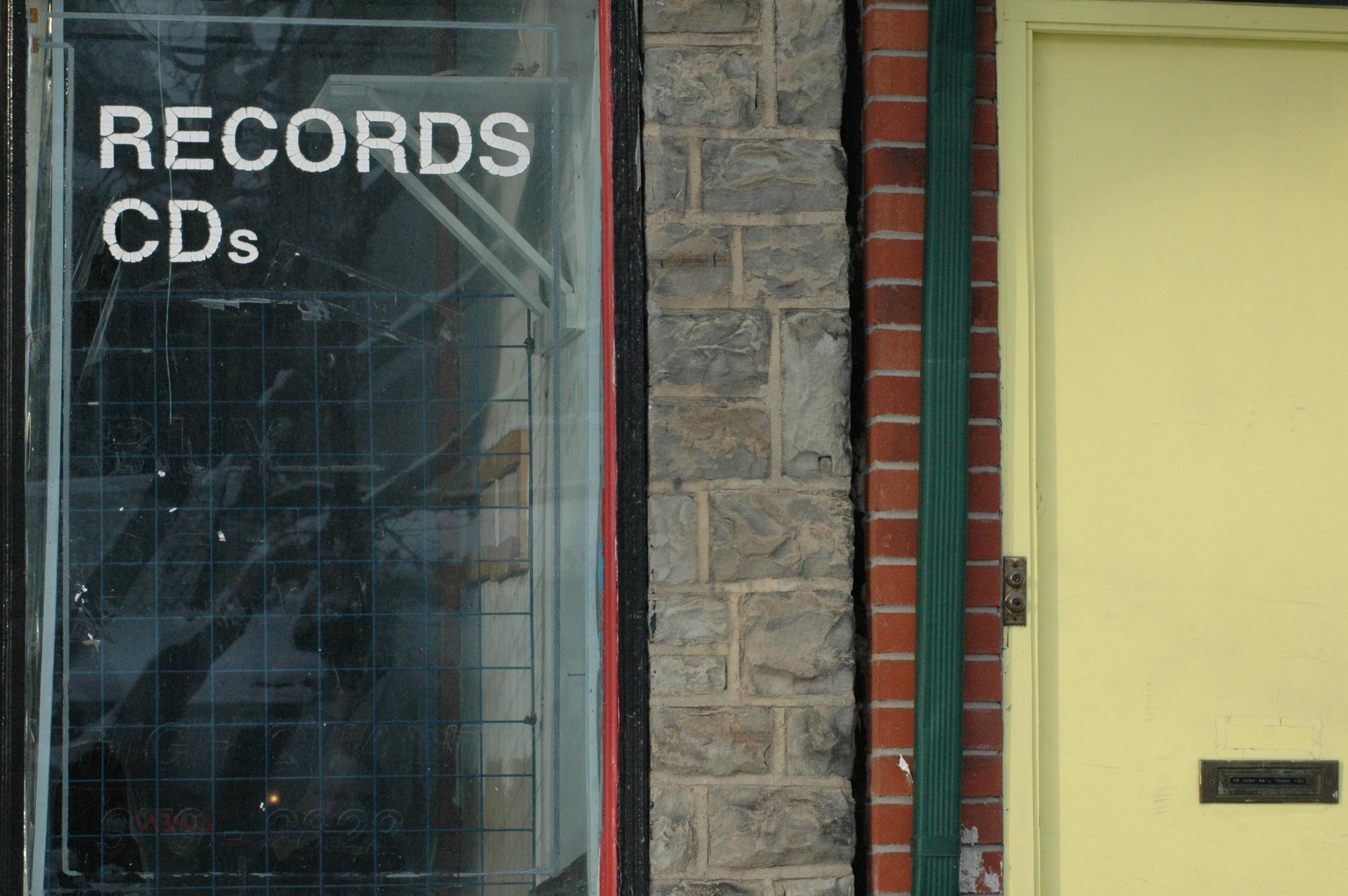 Free stock photo of city, record shop, store front