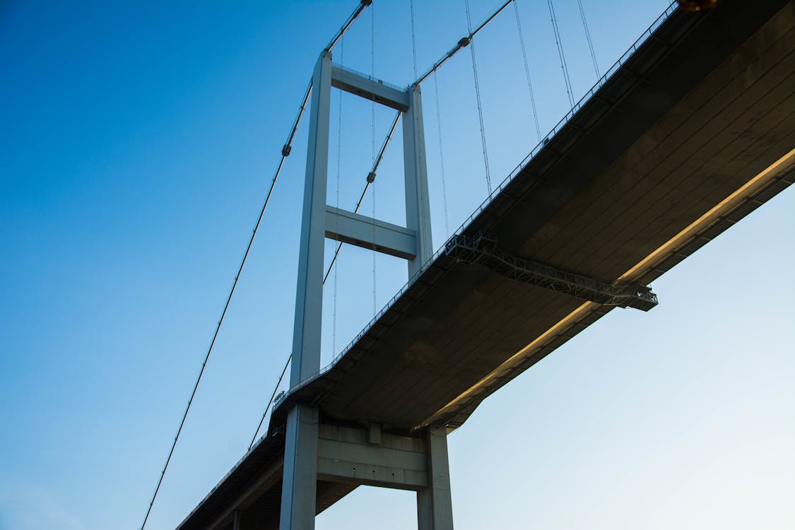 Low-Angle Shot of a Suspension Bridge · Free Stock Photo