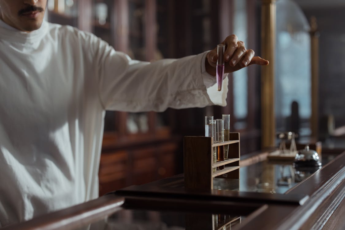 A Person Holding a Test Tube