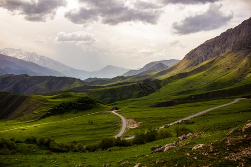 Free Explore the lush green hills and dramatic mountains in Ingushetia, Russia, showcasing nature's serene beauty. Stock Photo