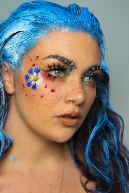 Free Woman With Face Paint and Blue Hair Stock Photo