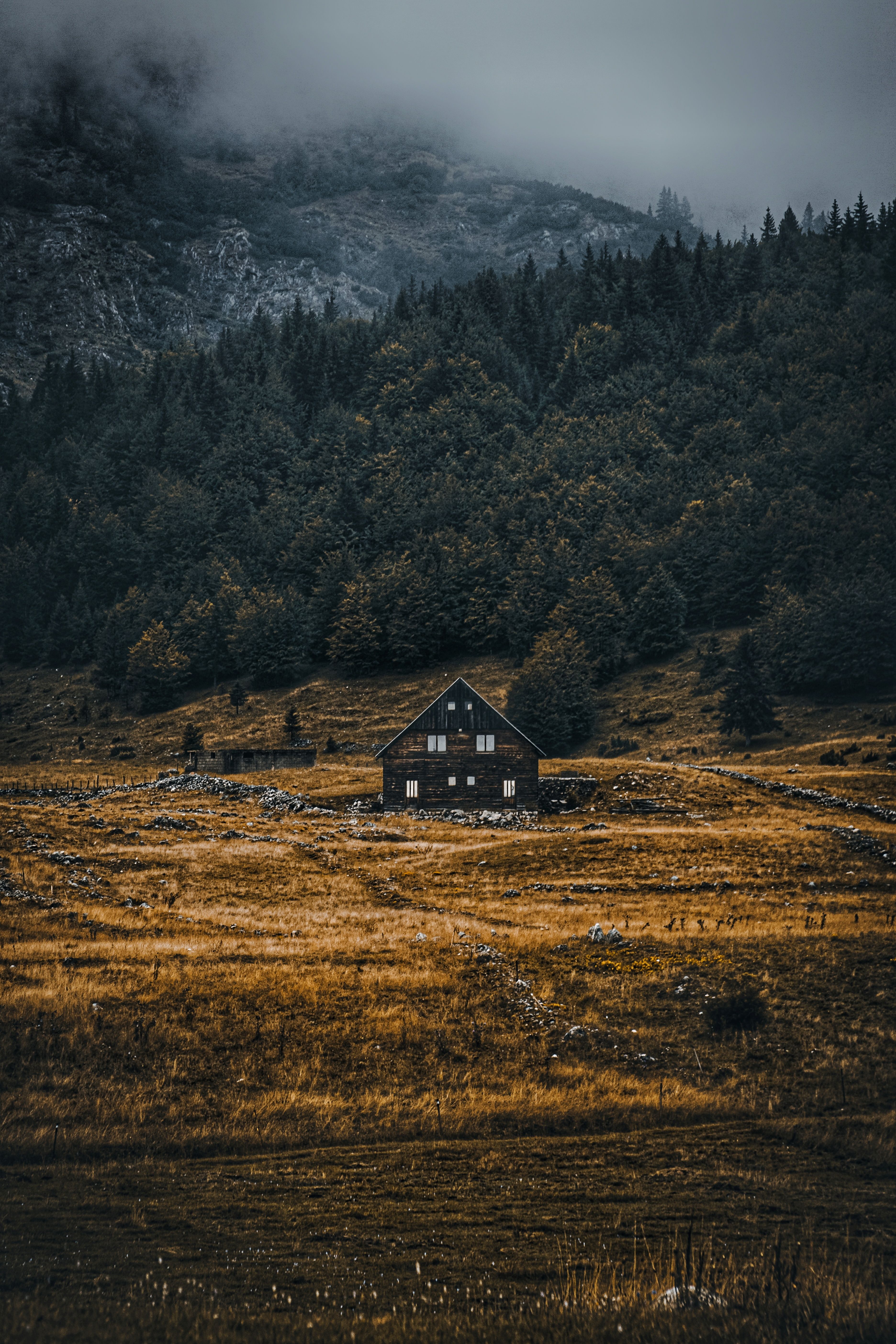 Brown Wooden House on Brown Grass Field · Free Stock Photo