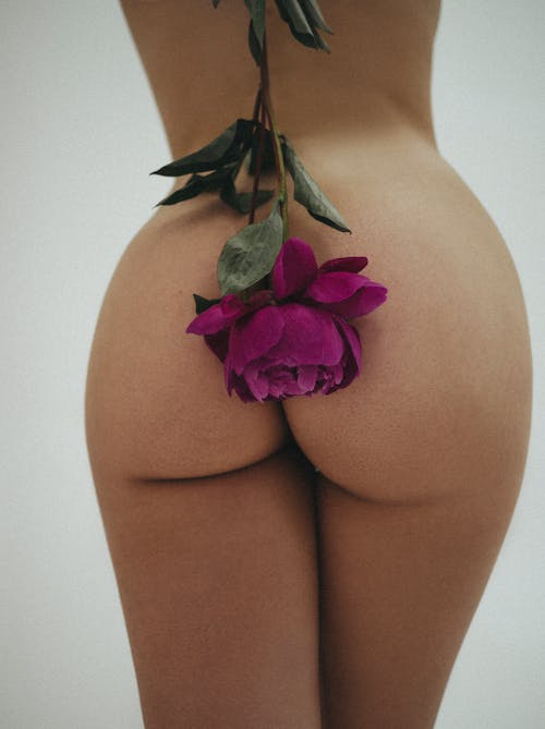 Free Purple Flower on Woman's Butt Stock Photo