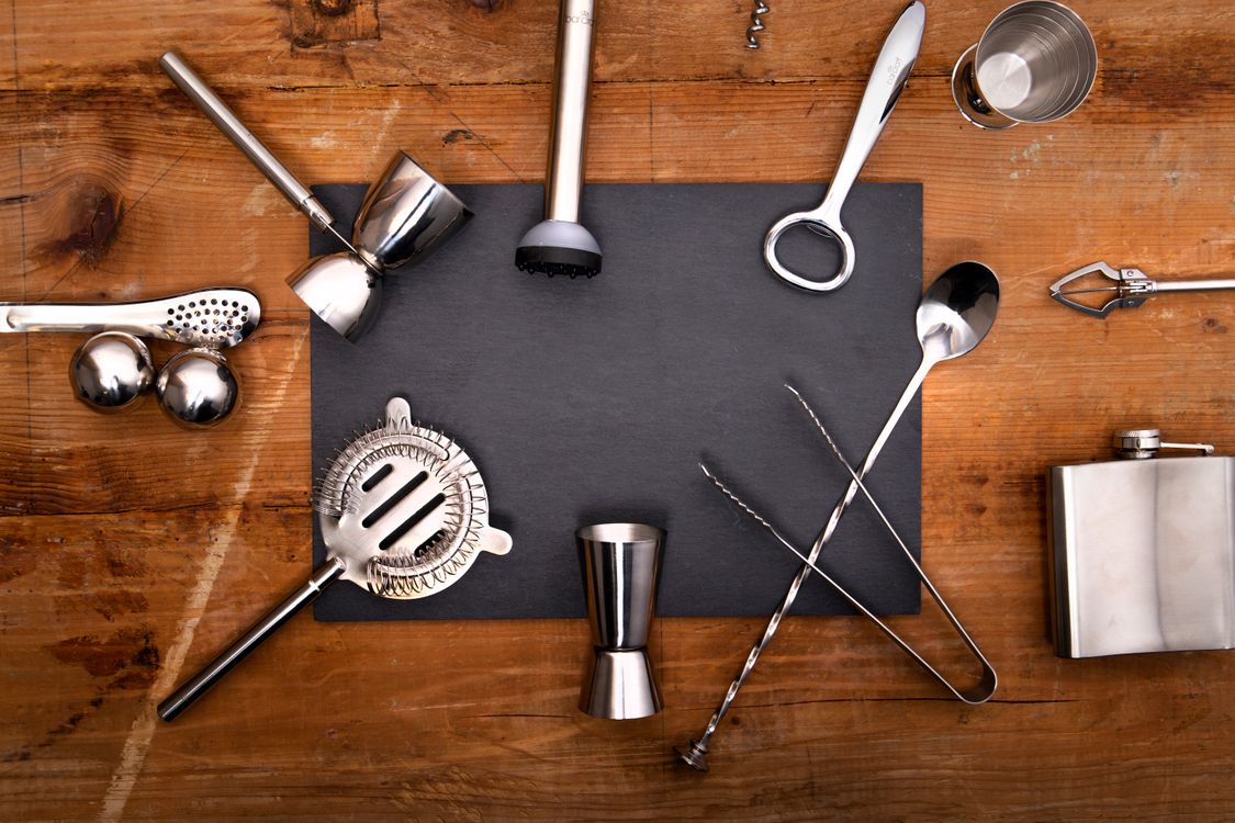 Close-Up Shot of Bar Tools on a Wooden Surface · Free Stock Photo
