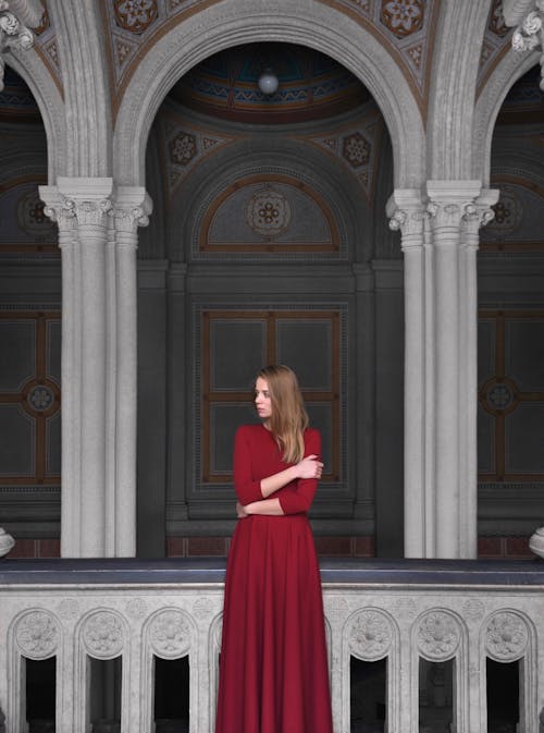 Woman In Red Long-sleeve Dress