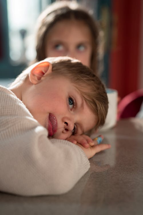 Photo of a Child Licking His Lips