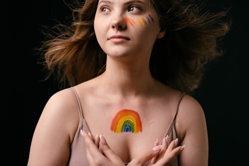Woman with Rainbow Painting on Her Chest